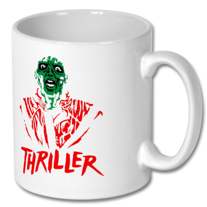 A white ceramic mug with a printed design featuring Michael Jackson's character from the movie 'Thriller'. The design includes red and green color accents and the text 'Thriller'.